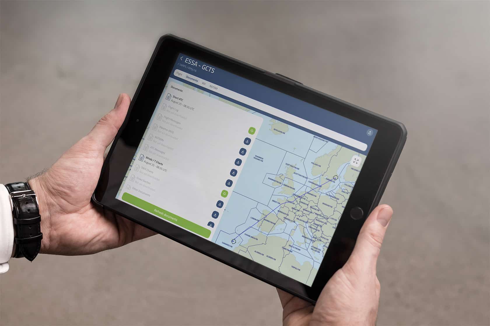 Route map with flight ESSA to GCTS. Left panel shows downloadable documents like ATC, NOTAMs, and weather updates.